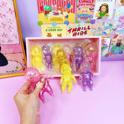 4Pcs Baby Squishy Glittery, 4" Soft Squeezable Fidget Toy, Slow Rising Squishy, Soft Squeeze Stress Relief,Cute Sparkly Sensory Decompression Doll for Adults, Portable Desk Decor & Anxiety Relief Gift
